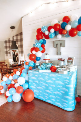 Airplane party treat table and custom balloon garland