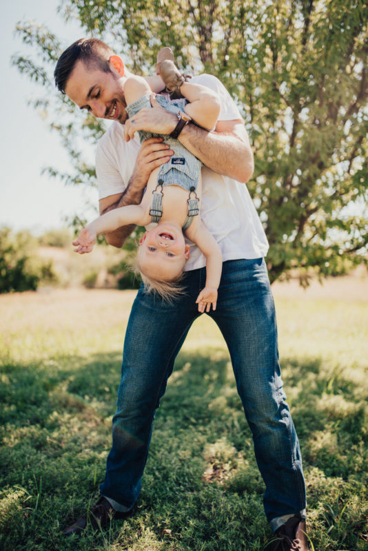 Premium Photo | A family poses for a photo with their baby