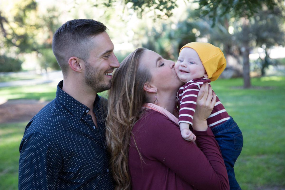 Loving Family Portrait with Three Members